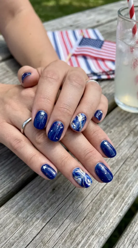 blue-marble-accent-nails