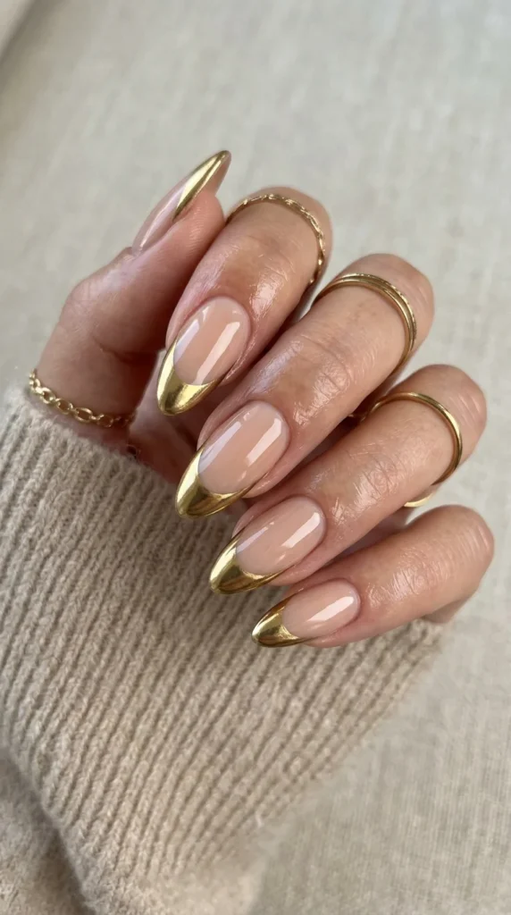 nude-nails-with-gold-chrome-tips